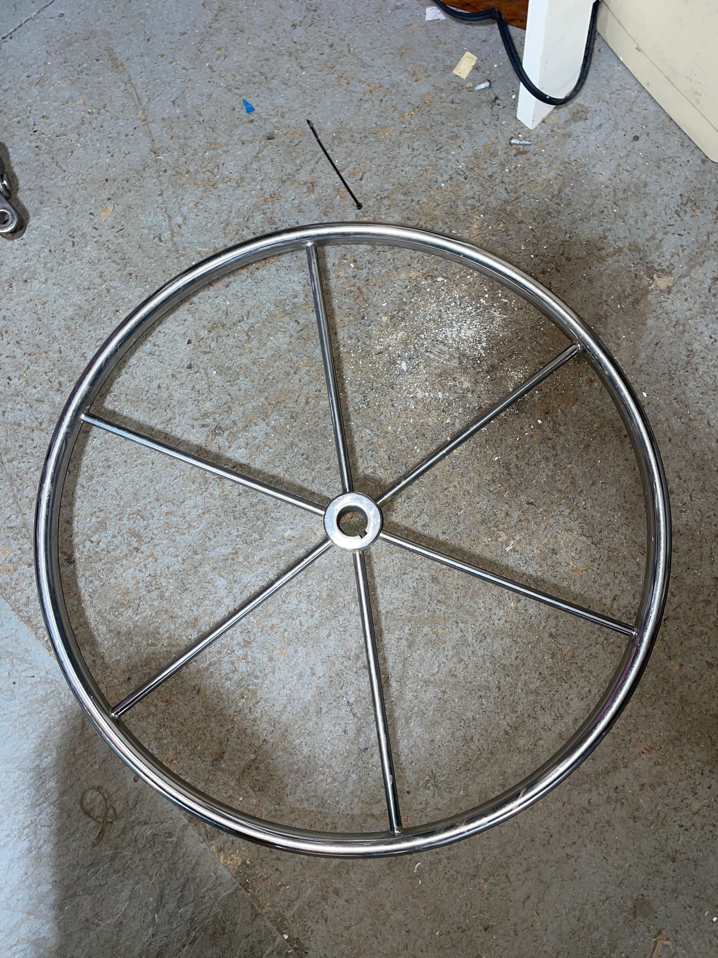 Metal wheel rim on a concrete floor
