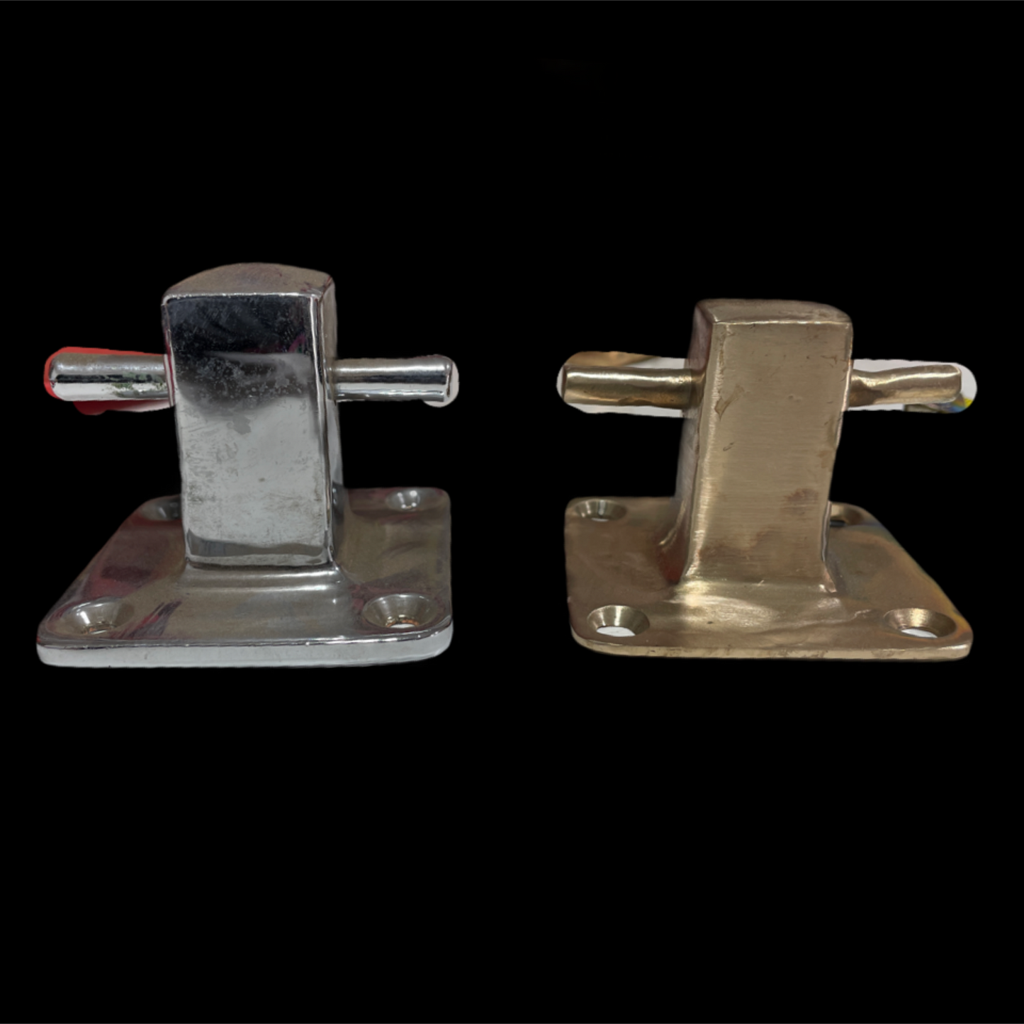 Pair of metallic clamps on a black background