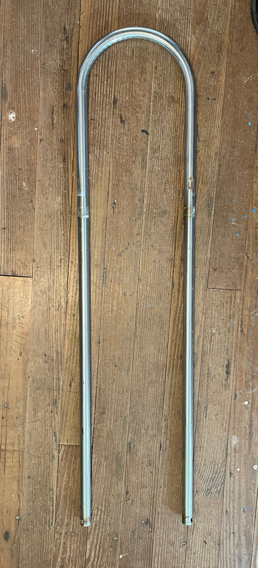 A stainless steel pedestal guard with 1/18 inch tubing, standing 40 1/2 inches tall with center-to-center measurement of 9 1/2 inches, displayed on a wooden surface.
