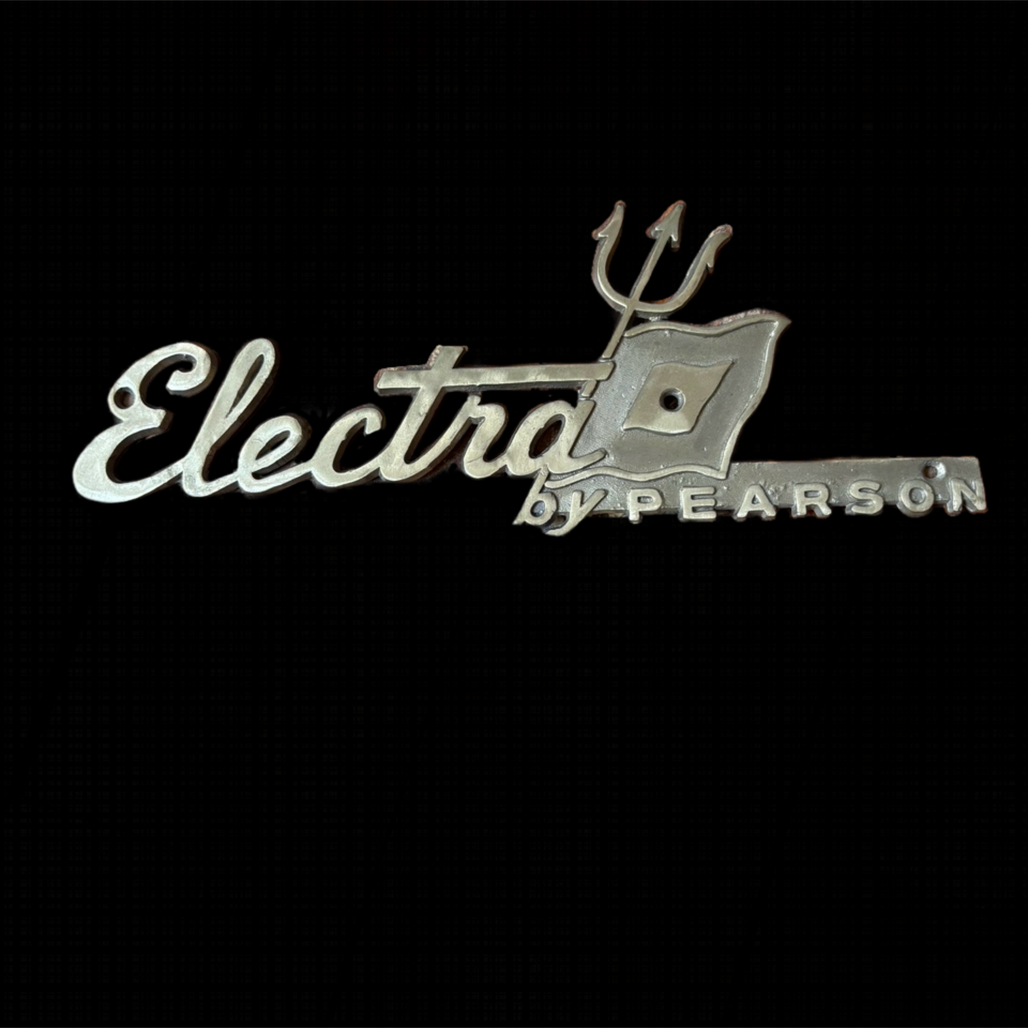 Metallic 'Electra by Pearson' logo on a black background