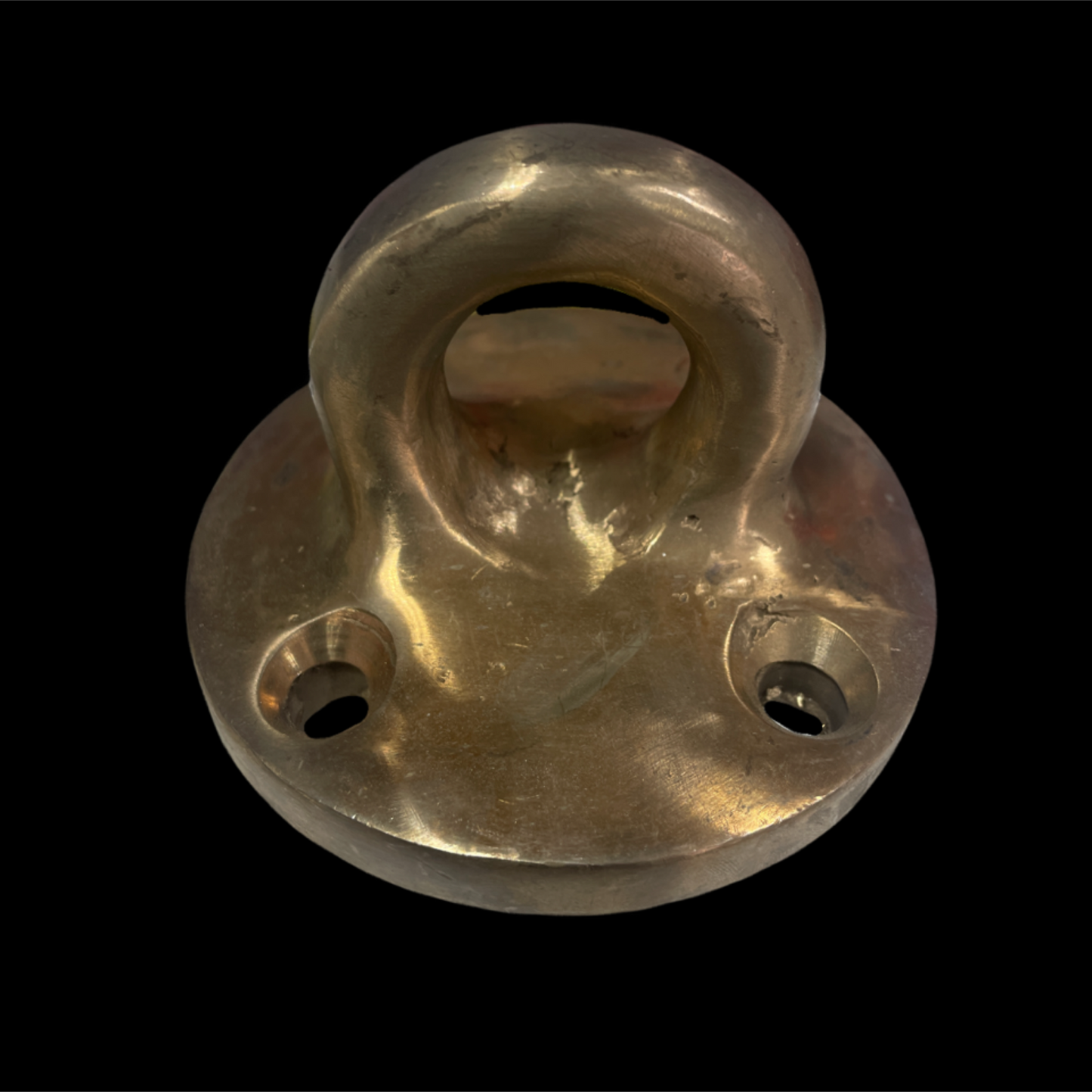 Brass hook on a black background