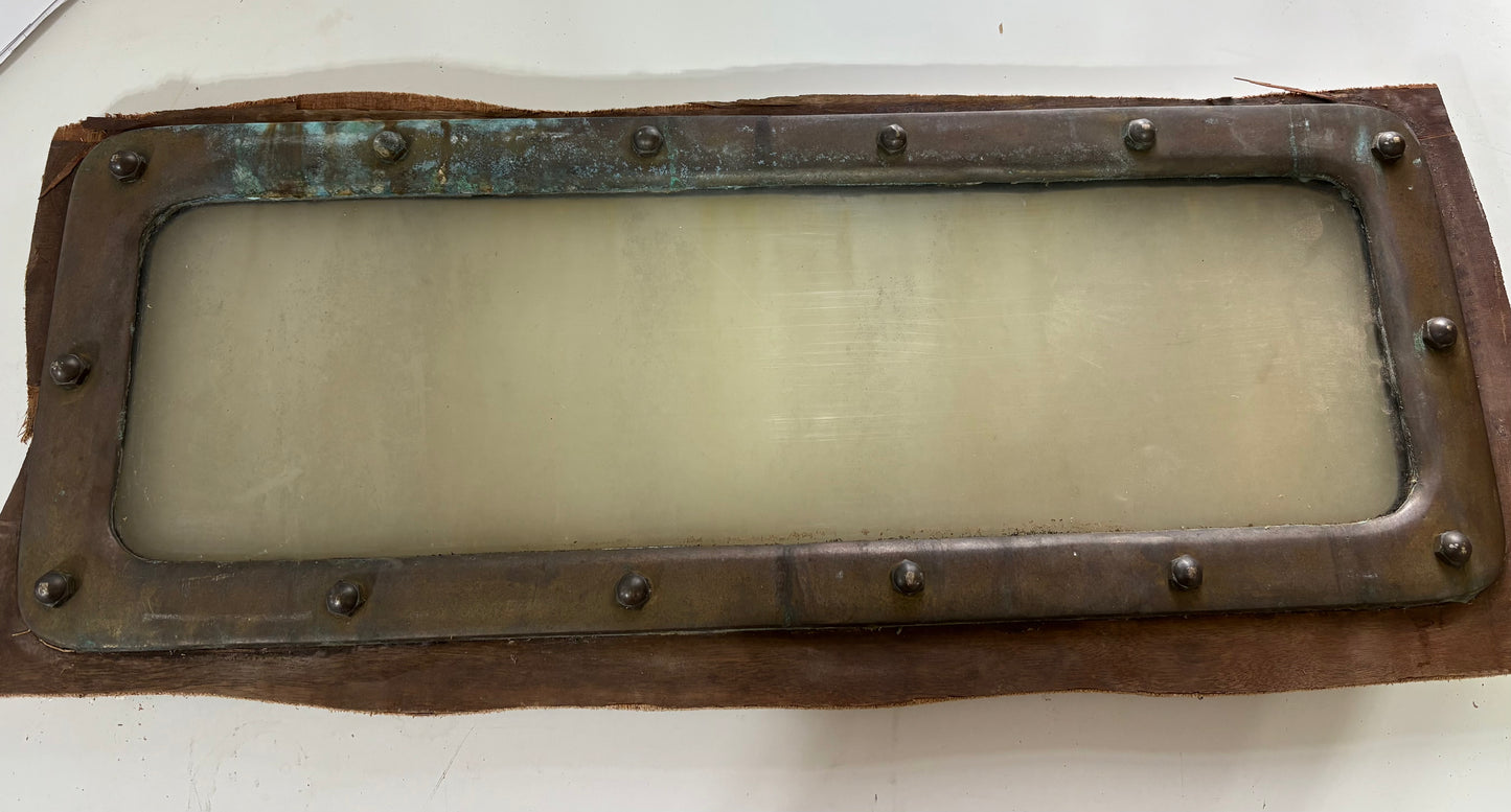 Bronze Fixed Porthole off of Crealock 37