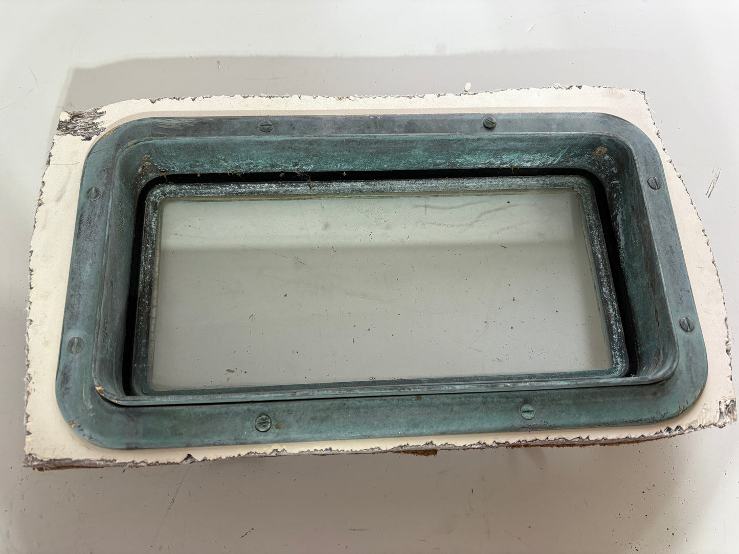 Bronze Portholes off Crealock 37 -- 12"x6"