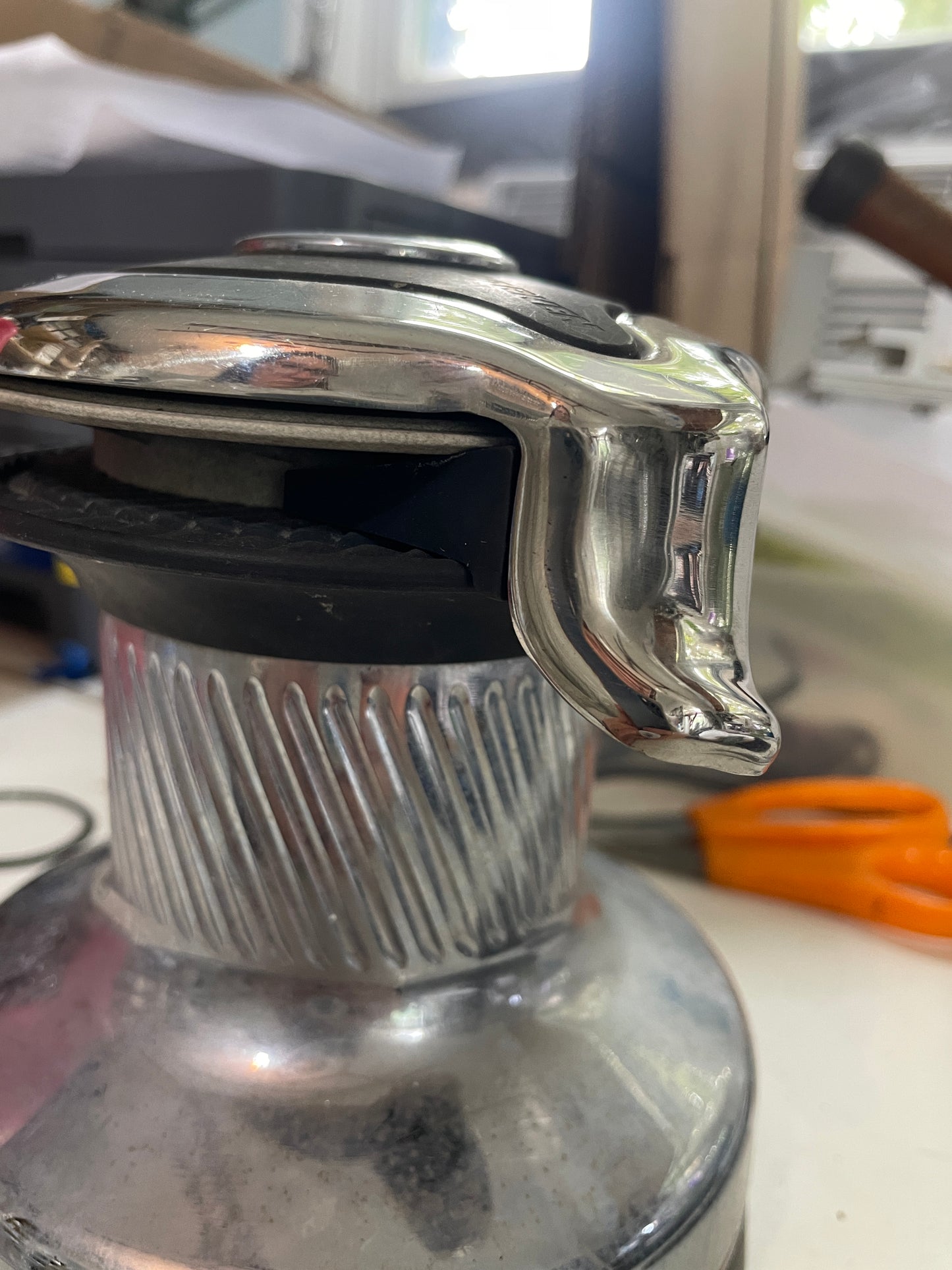 Metallic object with a reflective surface in an indoor setting