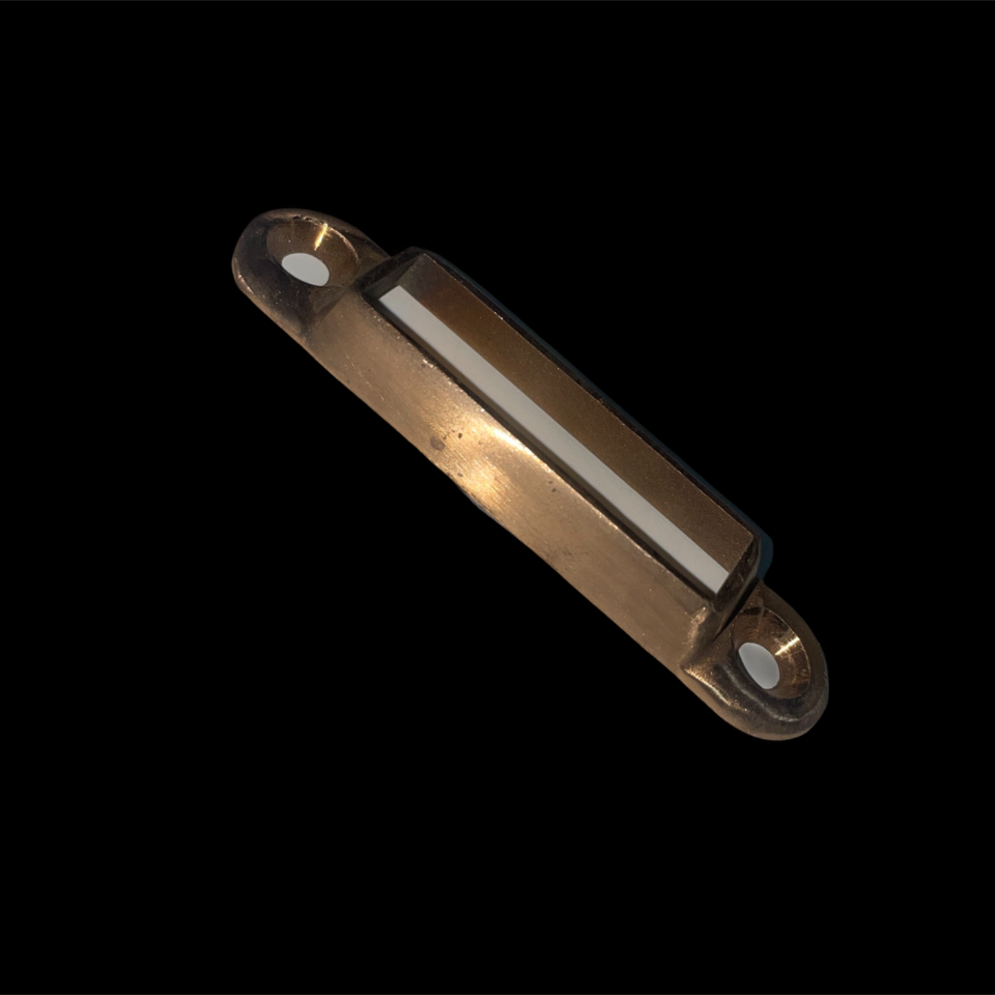Metallic object with reflective surface on a black background