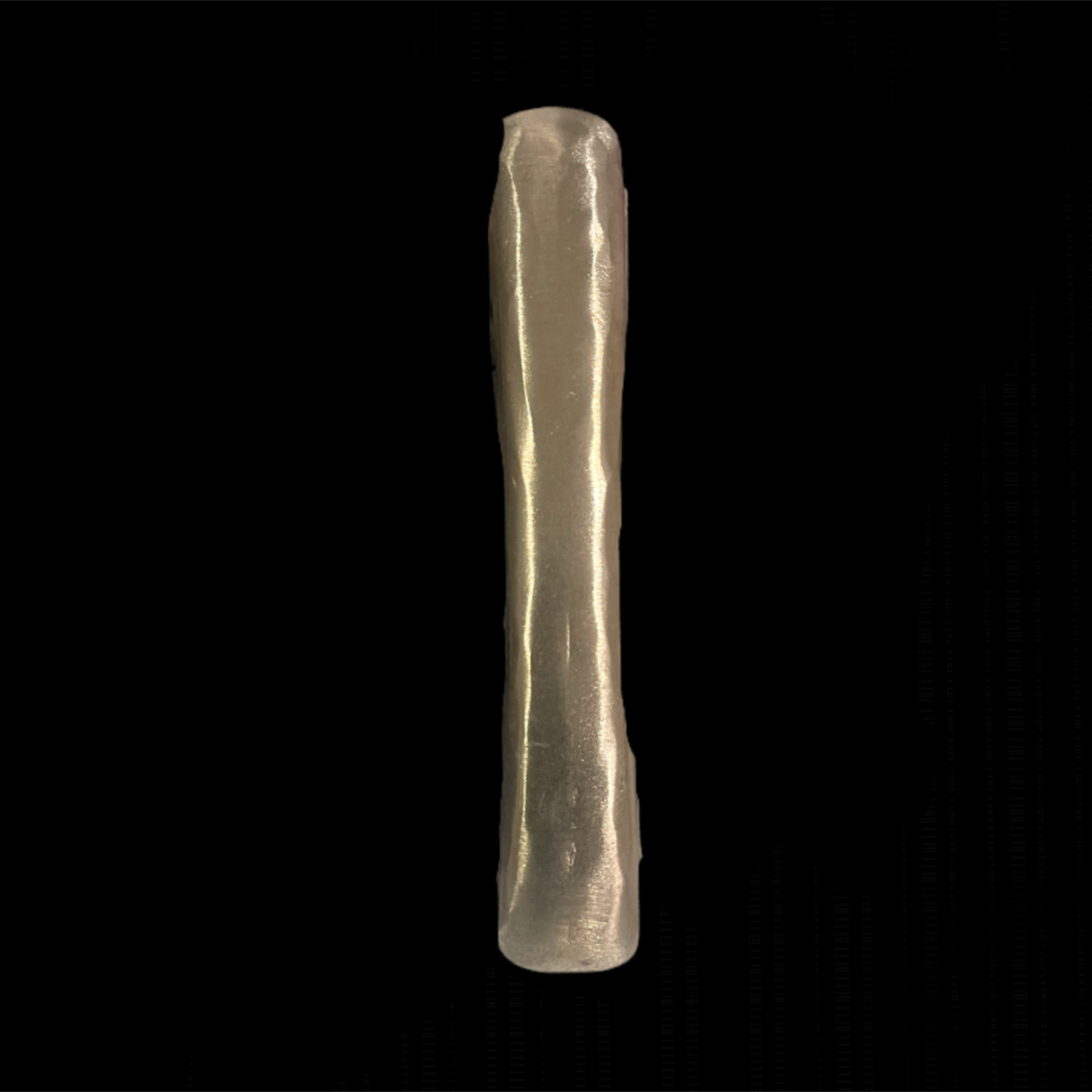 Clear cylindrical object on a black background