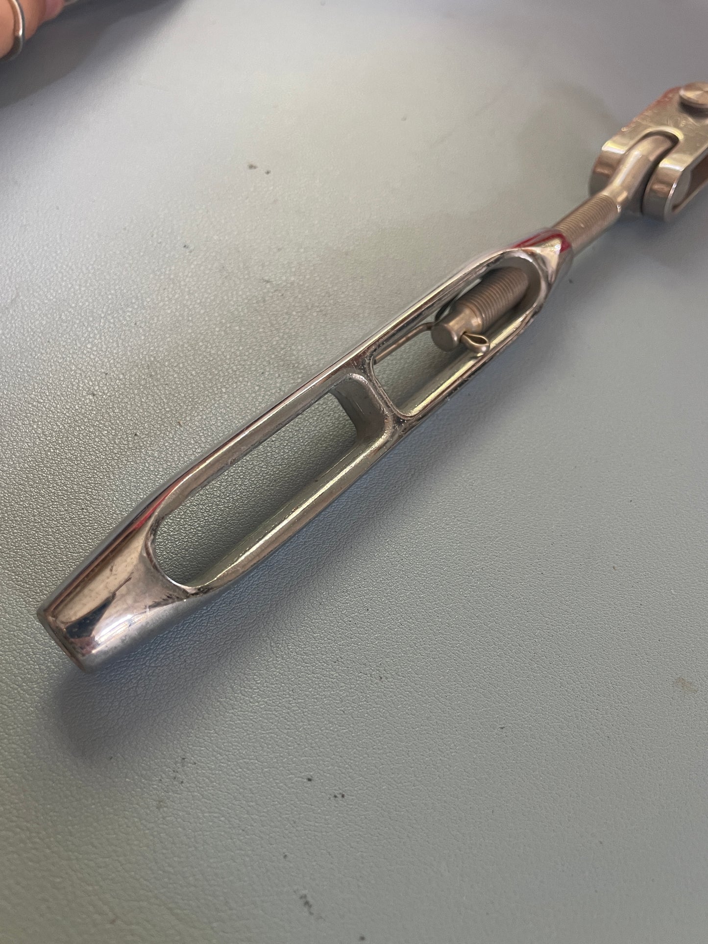 Metallic object on a gray background