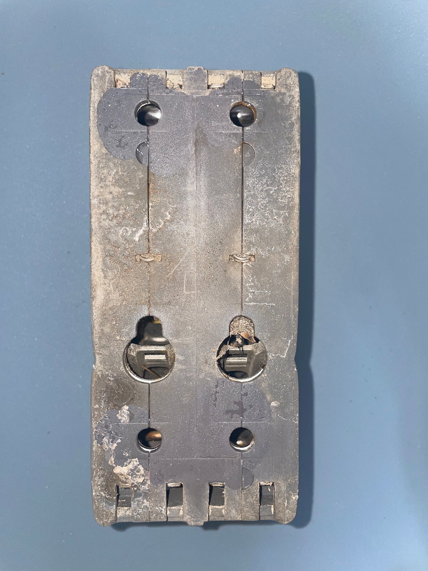 Metal mechanical component on a gray background