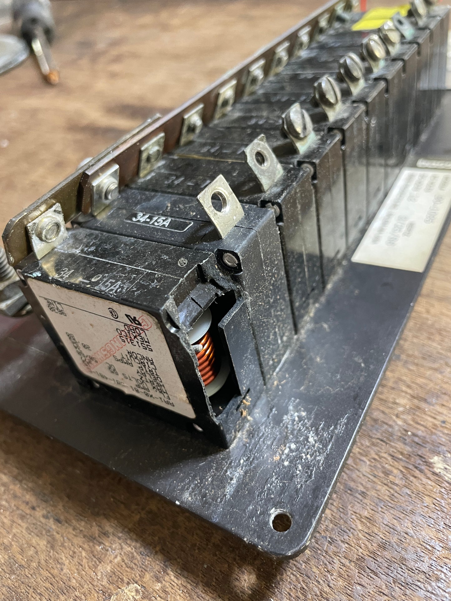 Electrical component with multiple connectors on a wooden surface