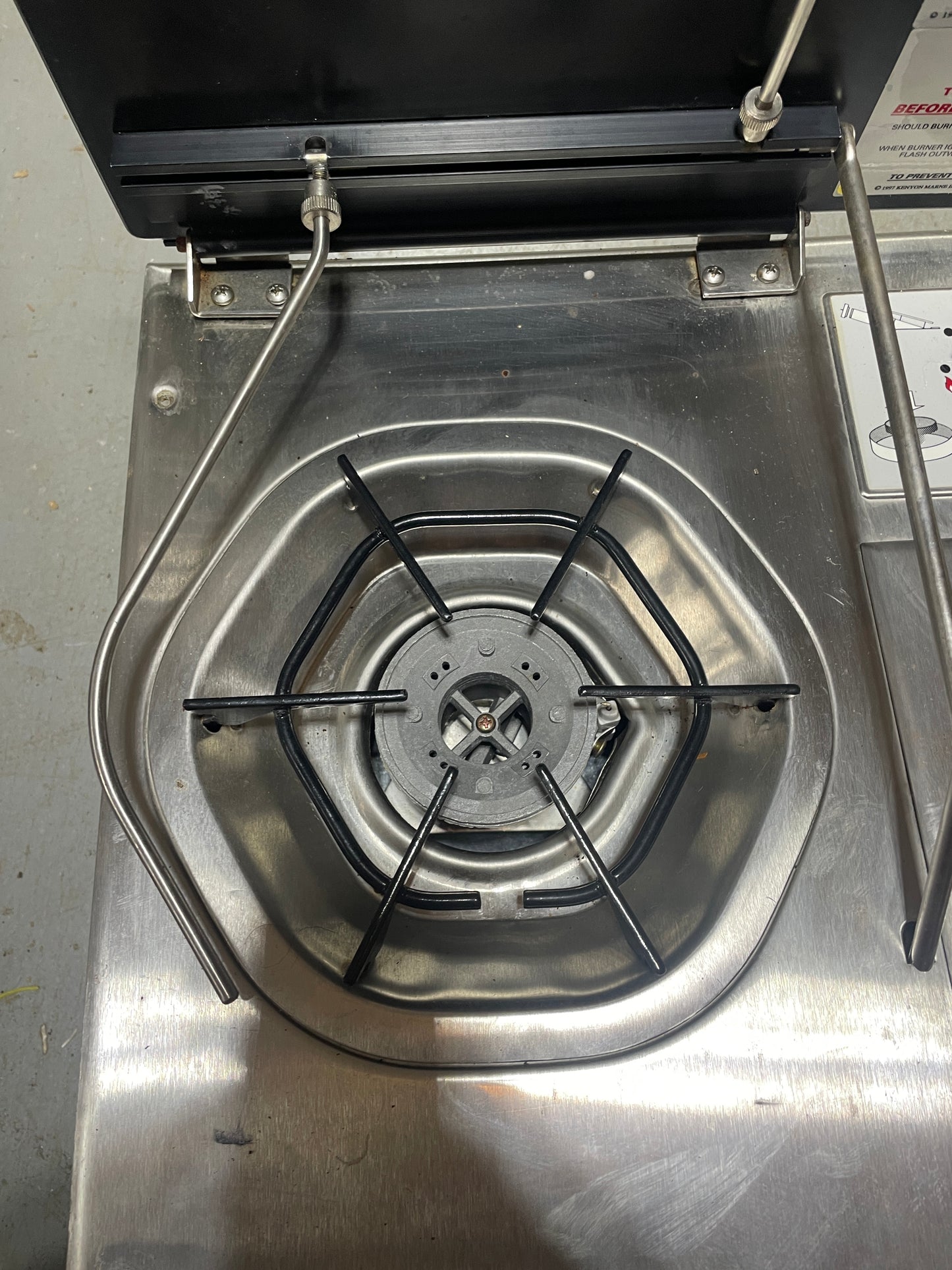 Stainless steel gas burner on a stove