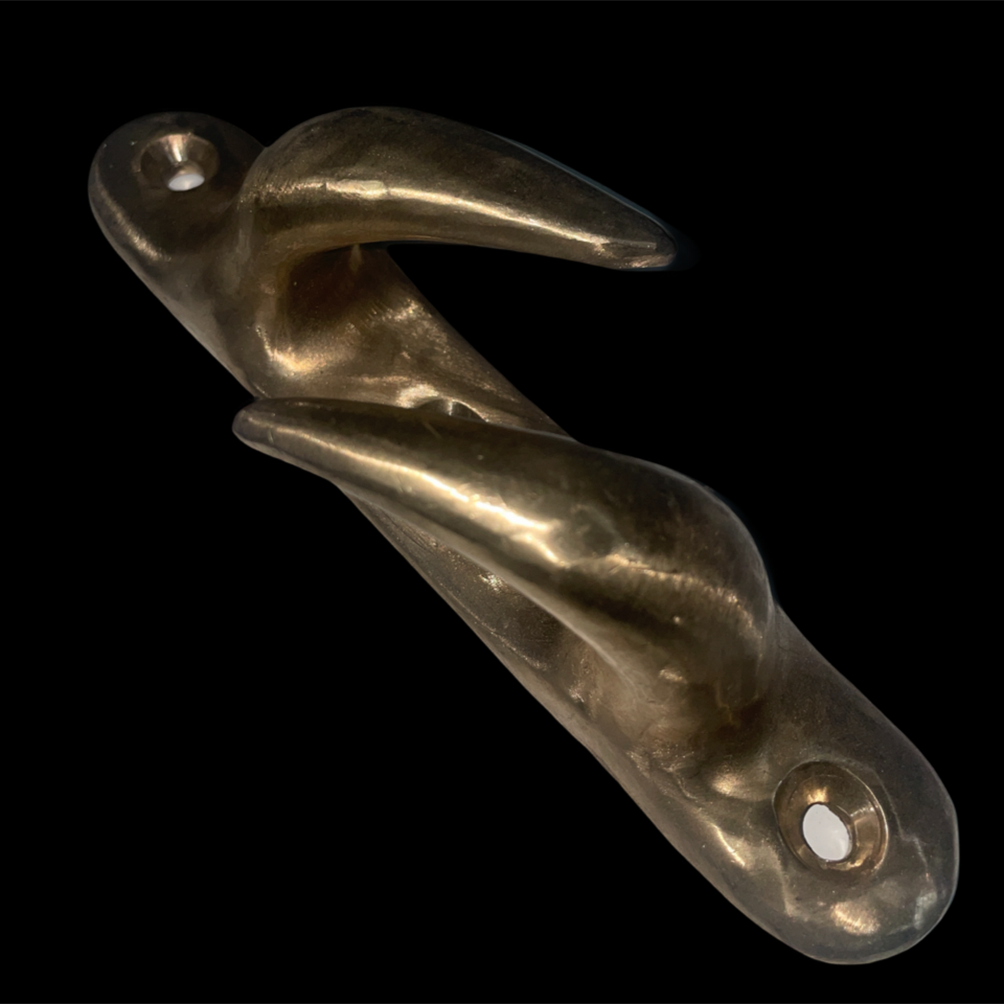 Brass door handle on a black background