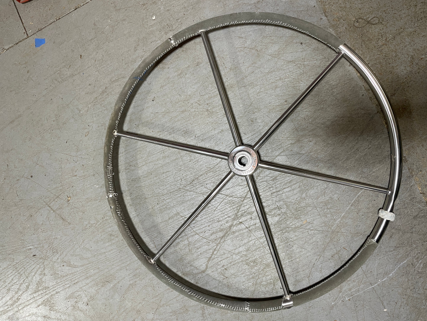 Metallic wheel rim on a concrete floor