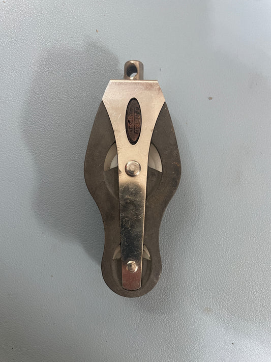 Metallic tool on a gray background