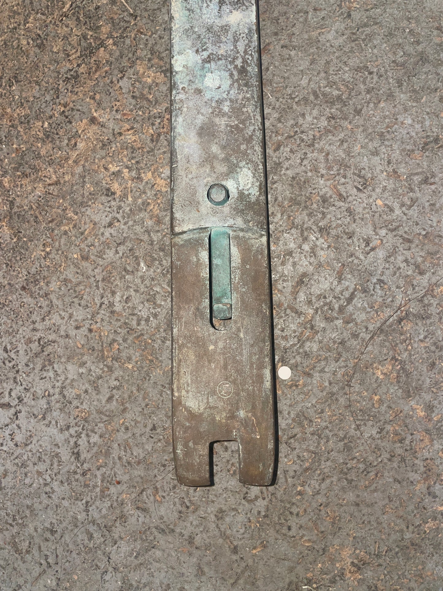Metal tool on a textured surface