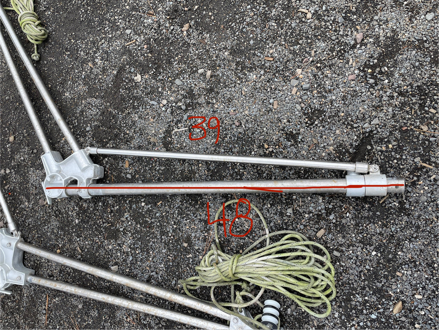 Metal rod with rope on a textured surface