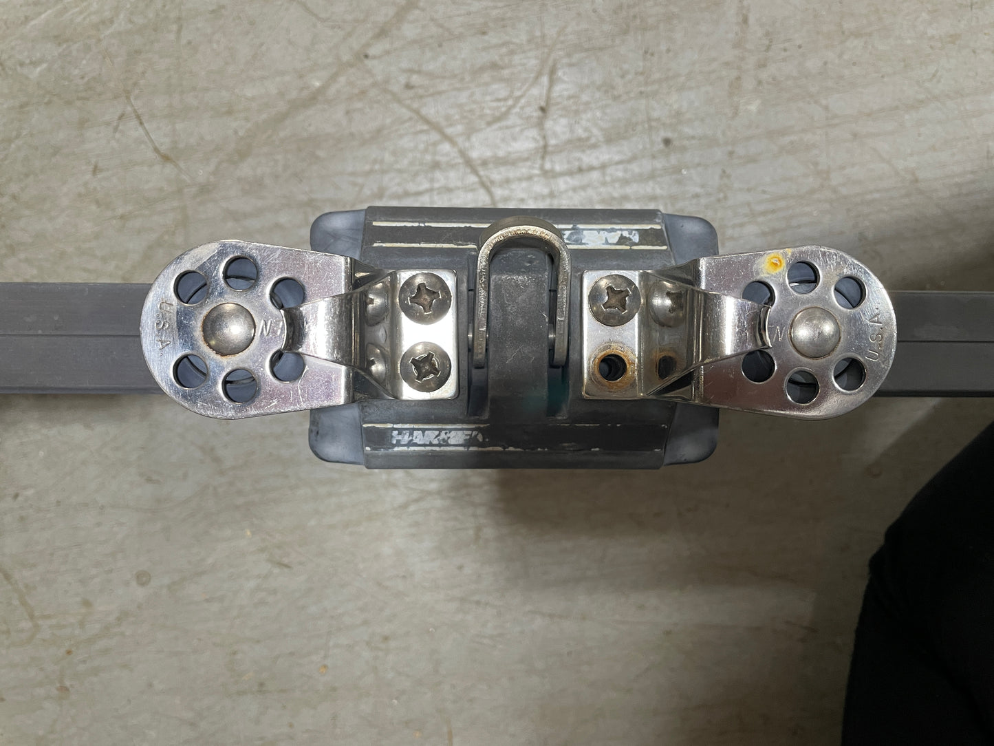Metallic object with circular components on a textured surface