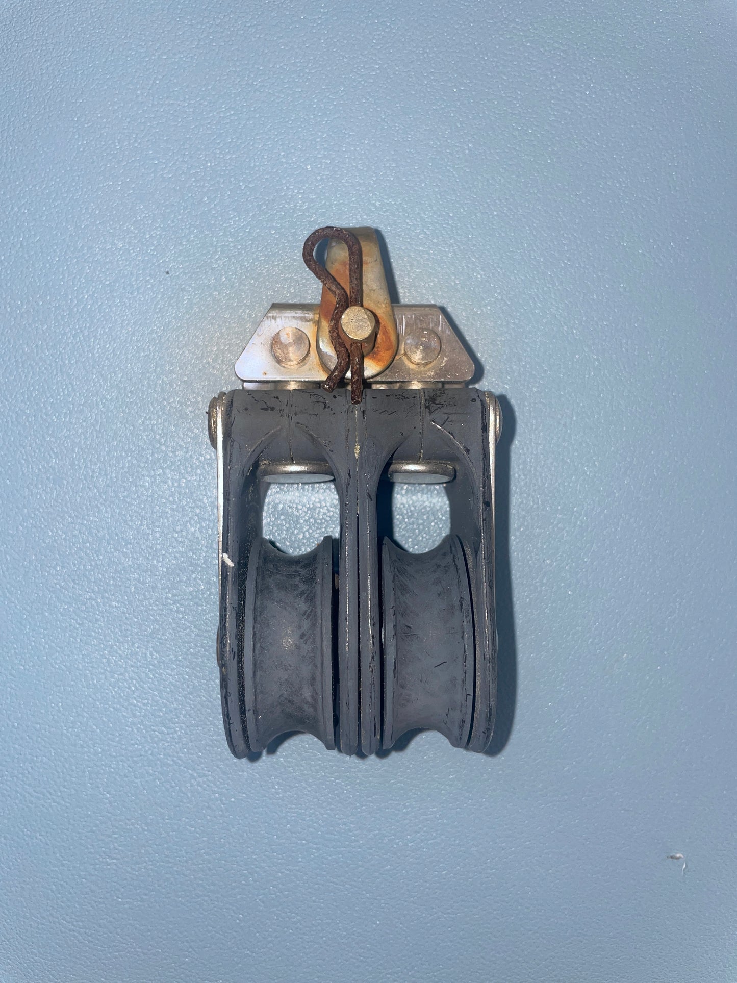 Mechanical component on a light blue background