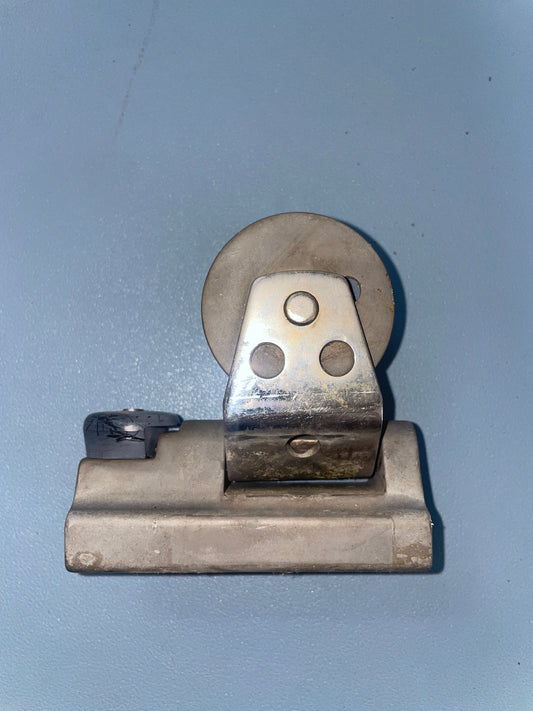 Metal door hinge on a gray background