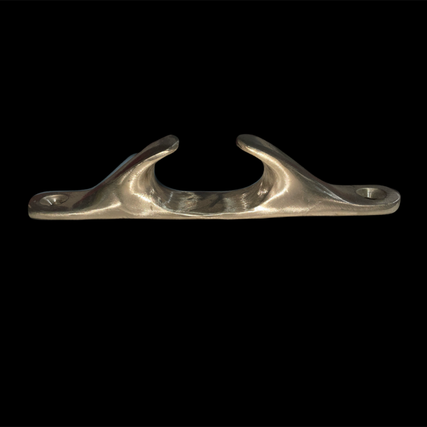 bronze cleat on a black background