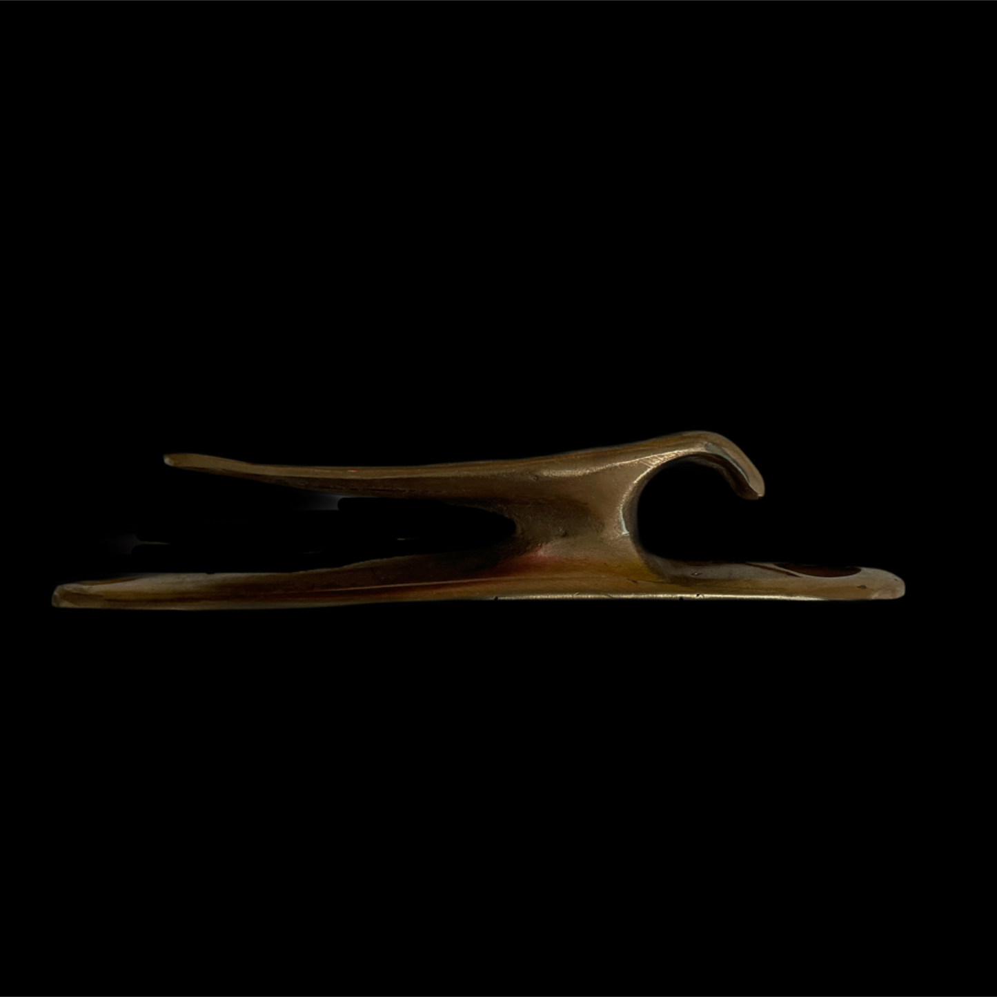 Decorative wooden sculpture on a black background