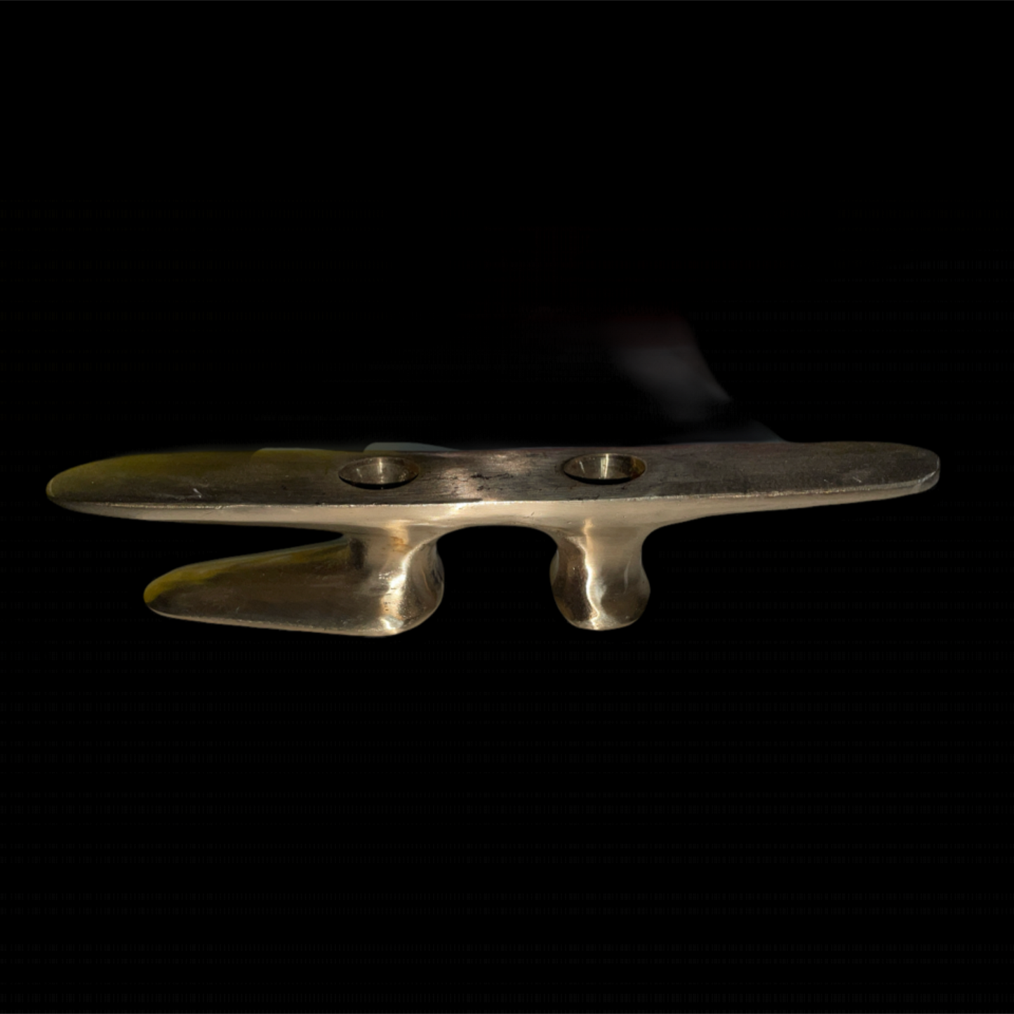 Metal cleat on a black background