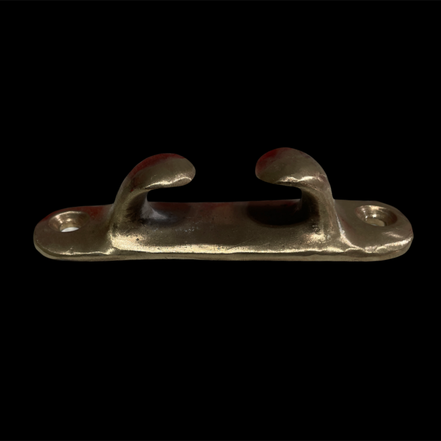 Metal cleat on a black background