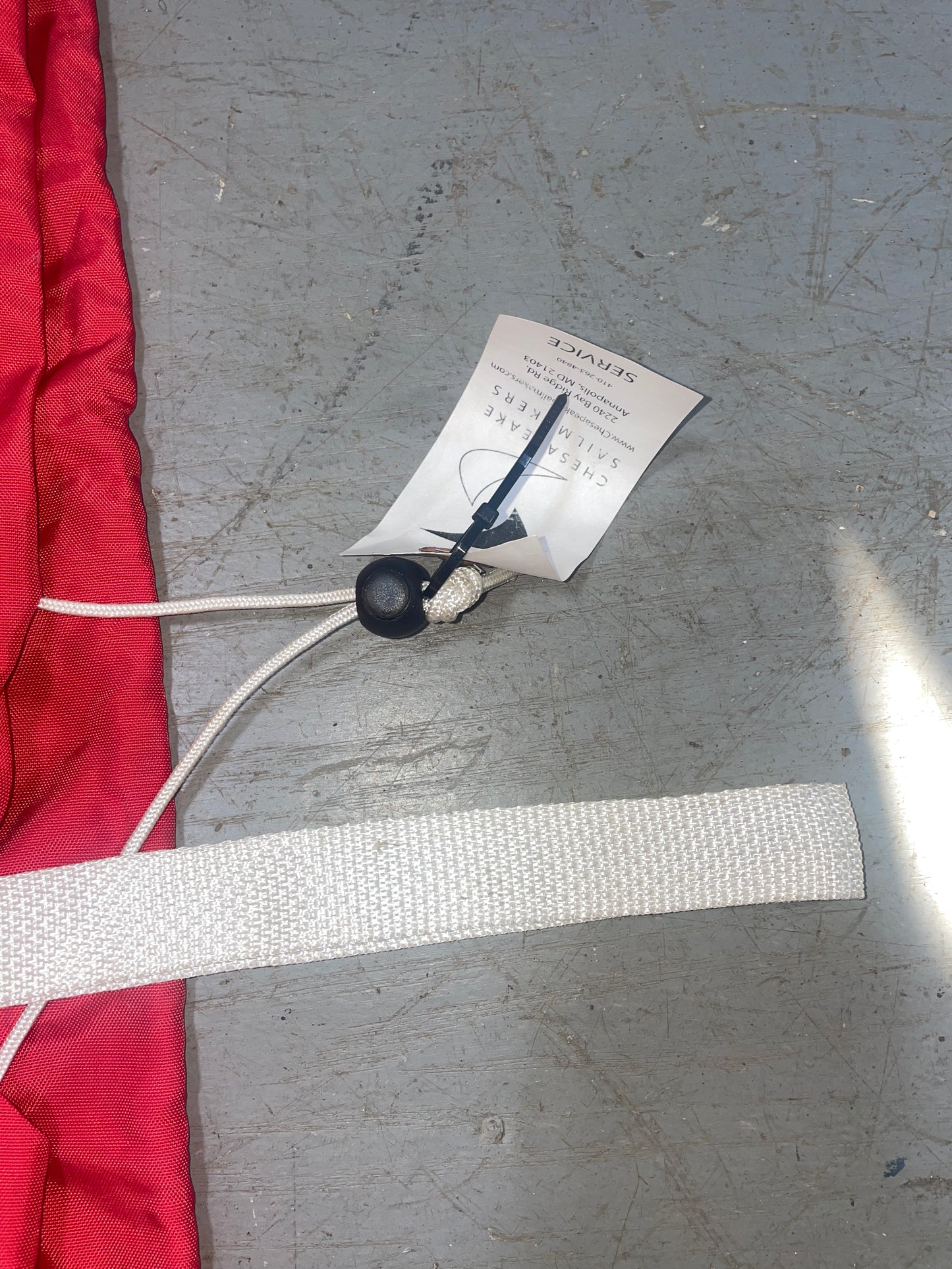 Small electronic device with a cable on a textured gray surface