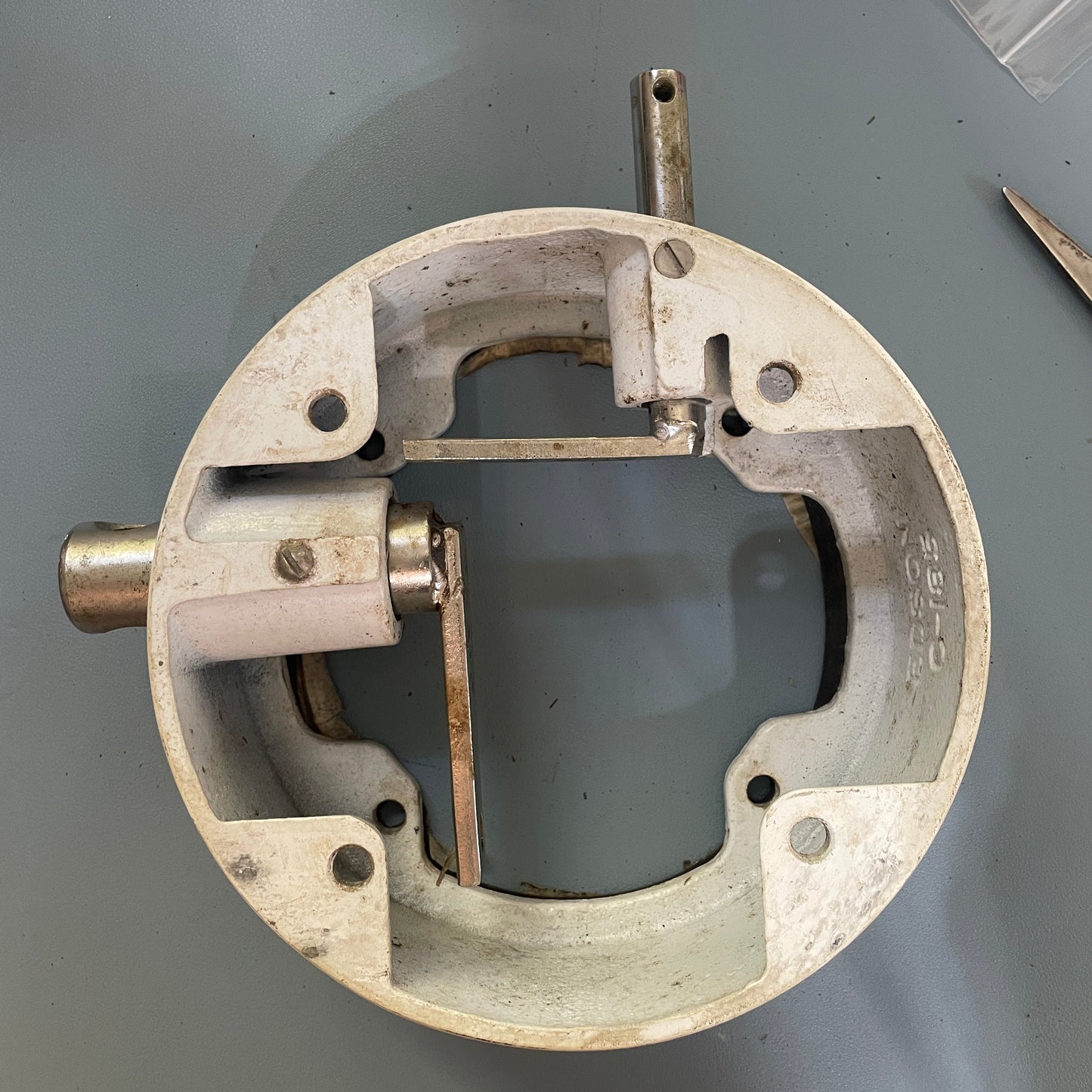 Metal mechanical component on a gray background