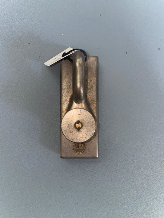 Metal latch on a gray background