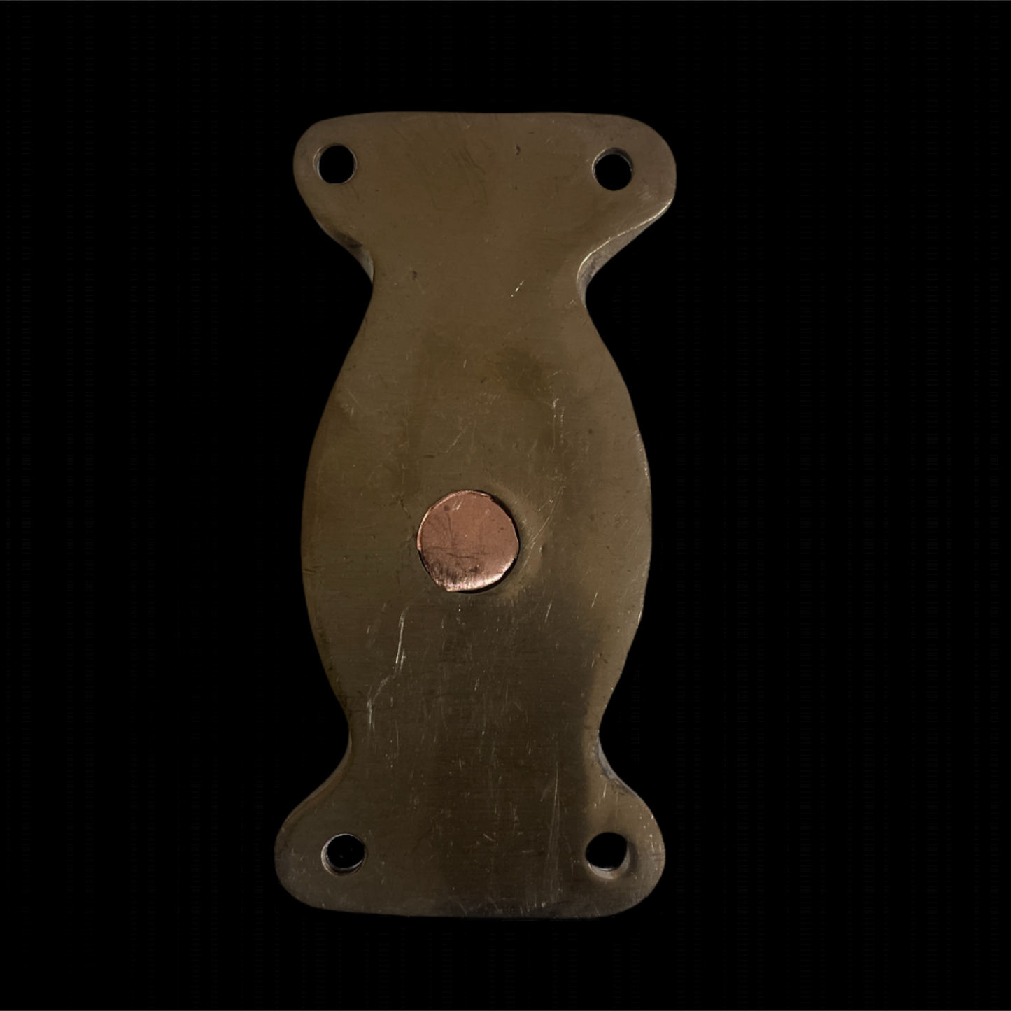 underside of bronze block
