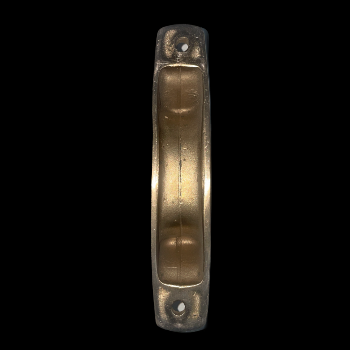 Bronze door handle on a black background