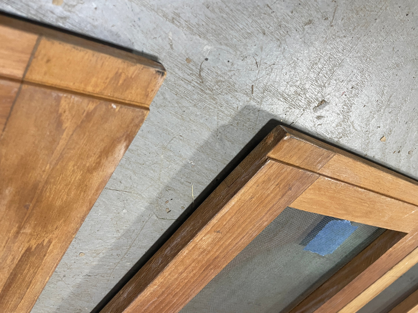 Wooden frames on a concrete surface