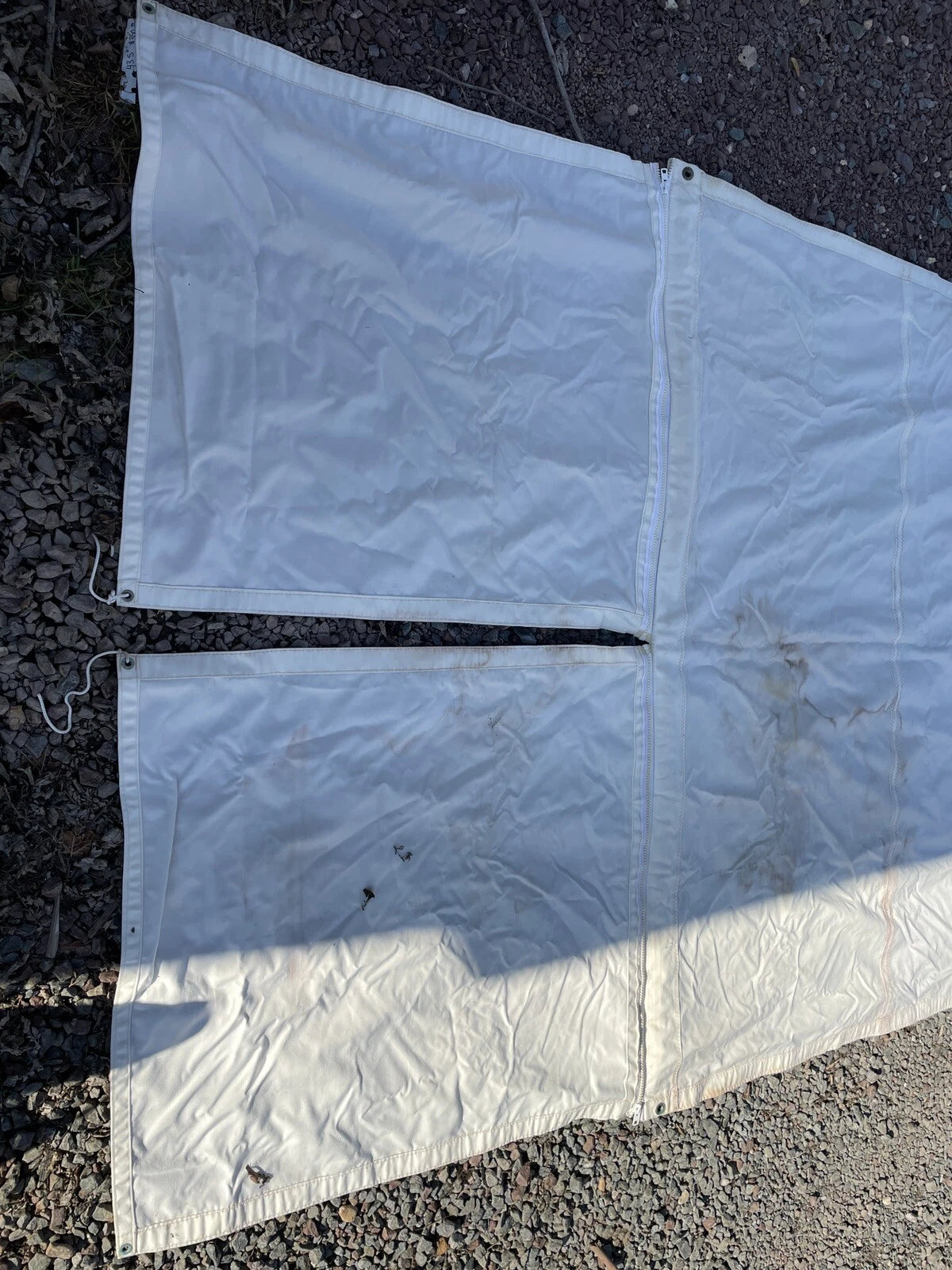 White Bimini extension with zippered cutout for backstay