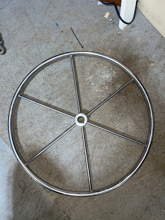 Metal wheel rim on a concrete floor