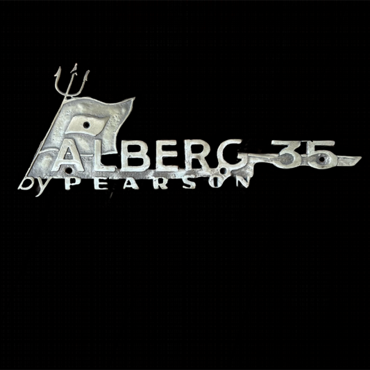 Vintage car emblem with 'Alberg 35 by Pearson' text on a black background