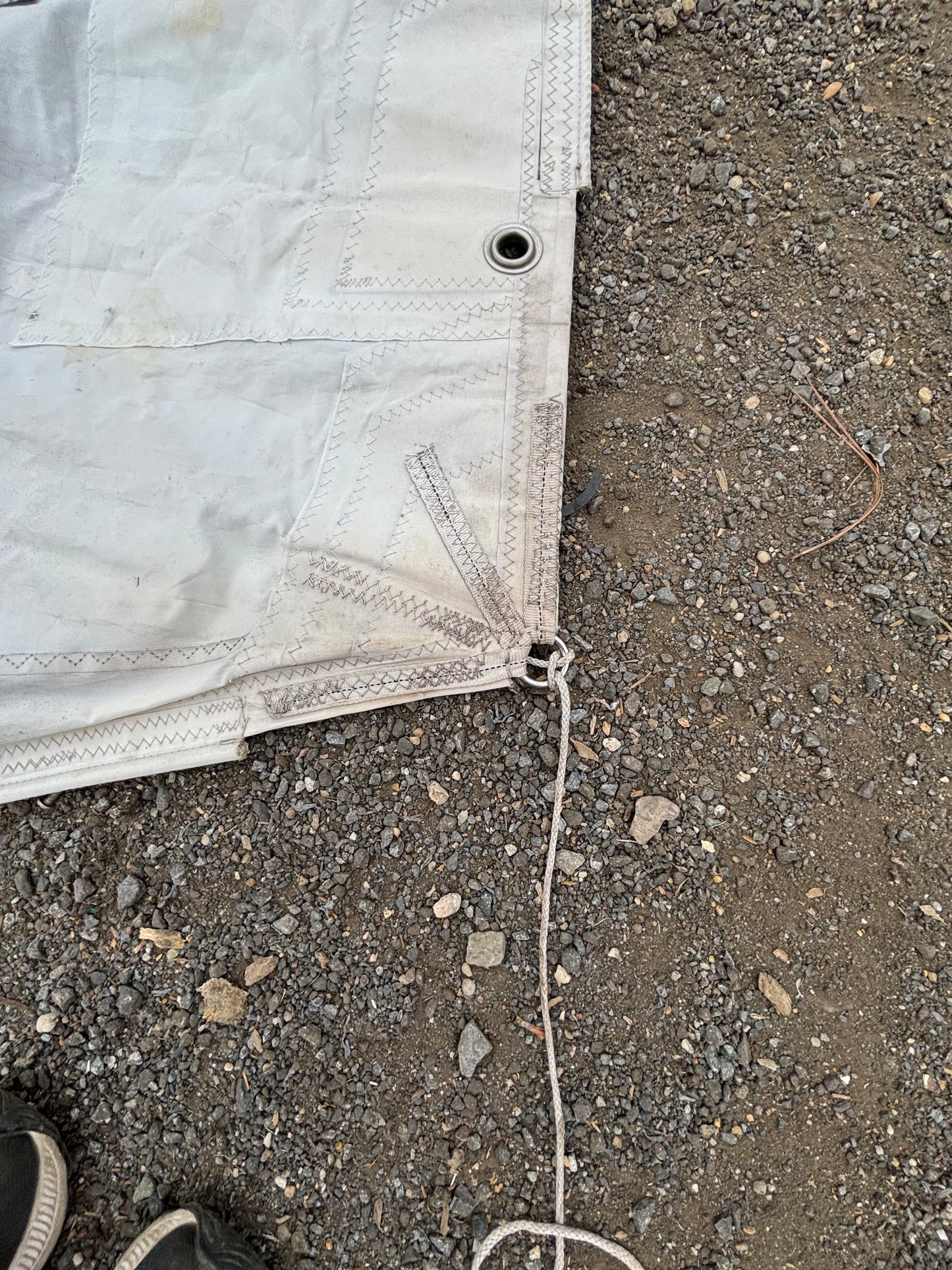 White on a sail surface with visible stitching