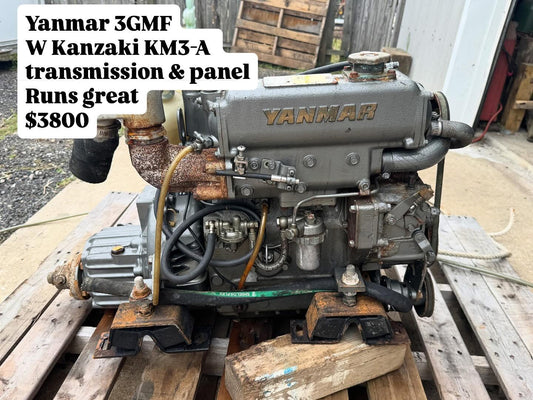 Yanmar 3GMF engine with Kanzaki KM3-A transmission on a wooden pallet.