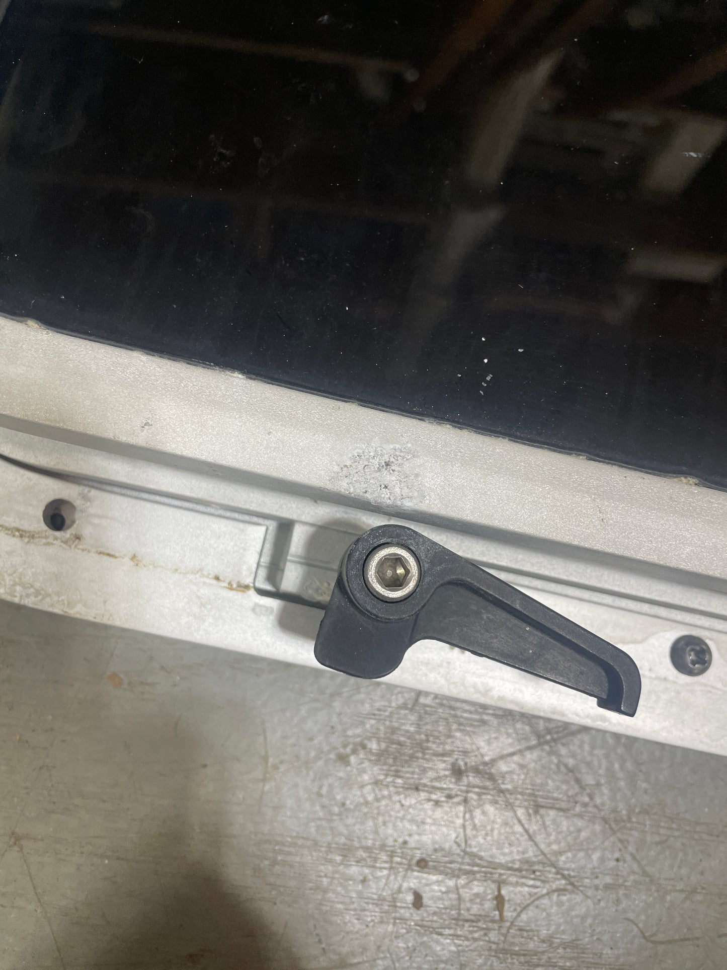 Close-up of a mechanical component on a metal surface