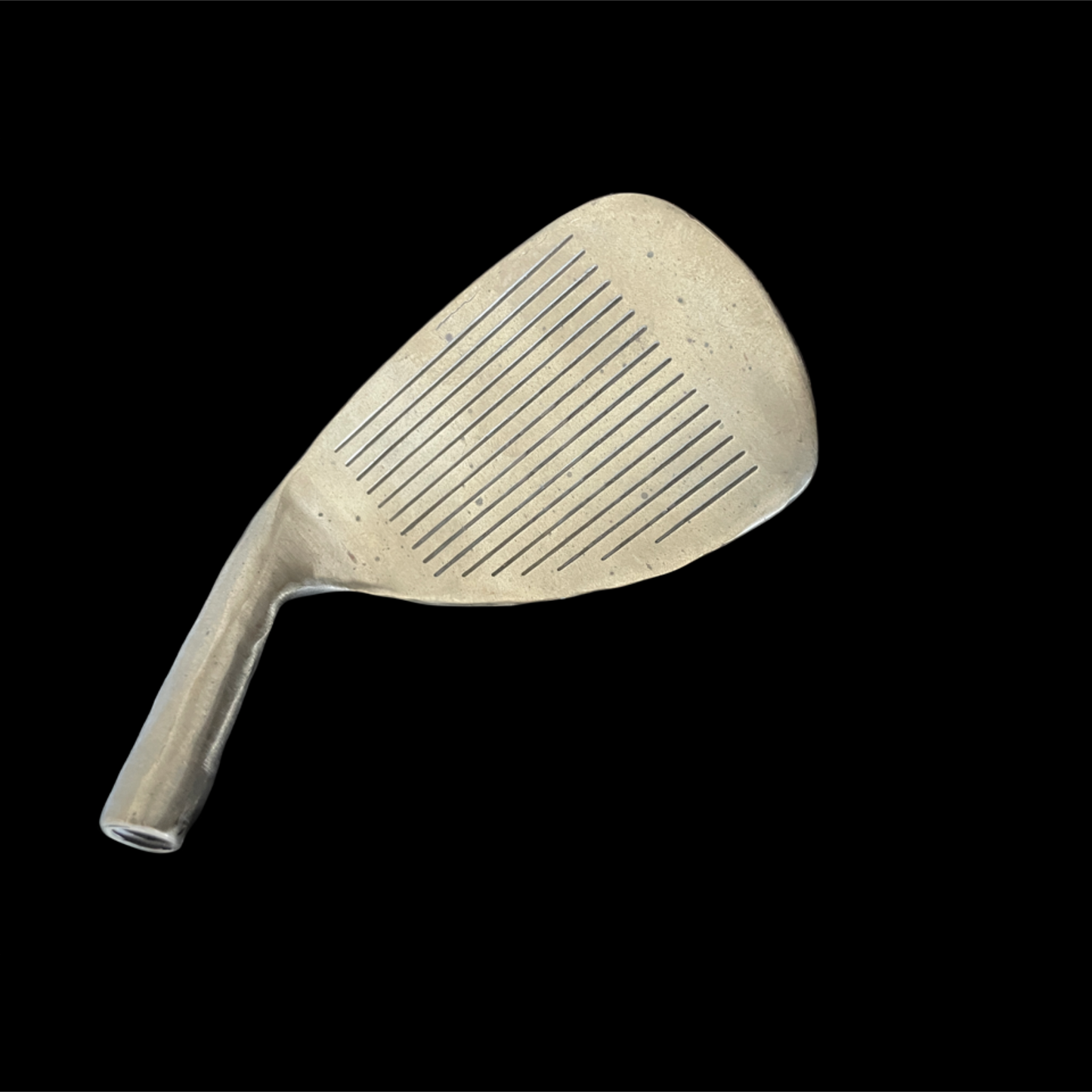 Golf club head on a black background