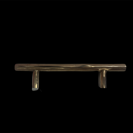 Metallic door handle on a black background