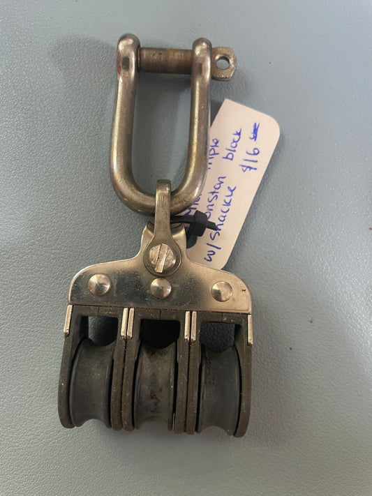 Metal clasp with a label on a gray background