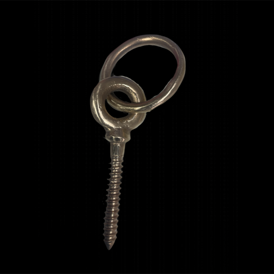 Metal screw with two loops on a black background