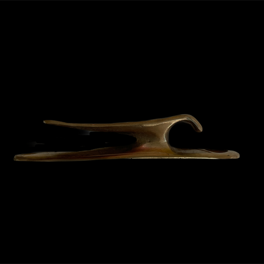 Decorative wooden sculpture on a black background